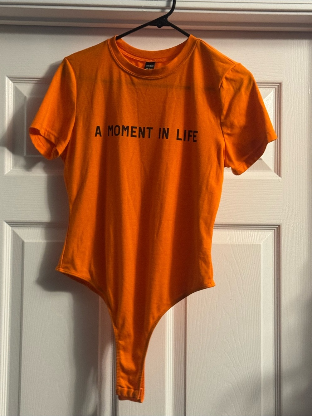 Orange Bodysuit "A Moment In Life" Graphic tee